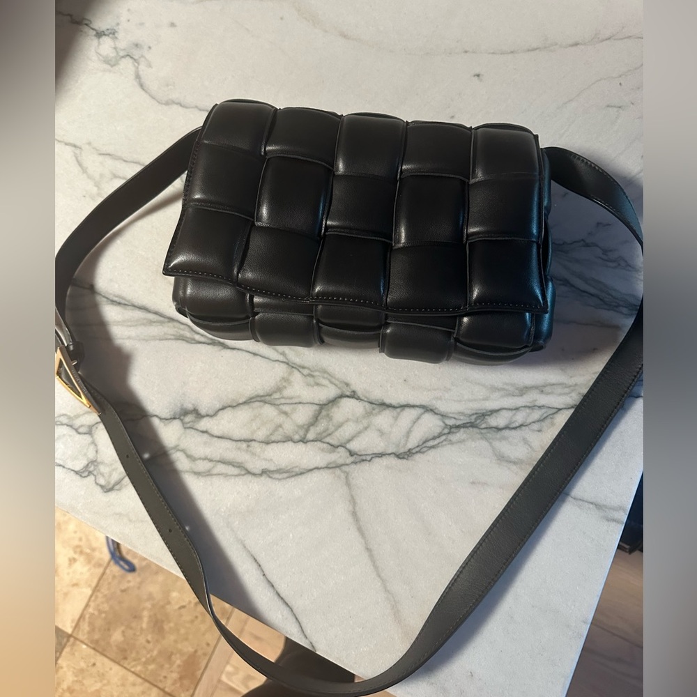 Puffy padded black leather purse